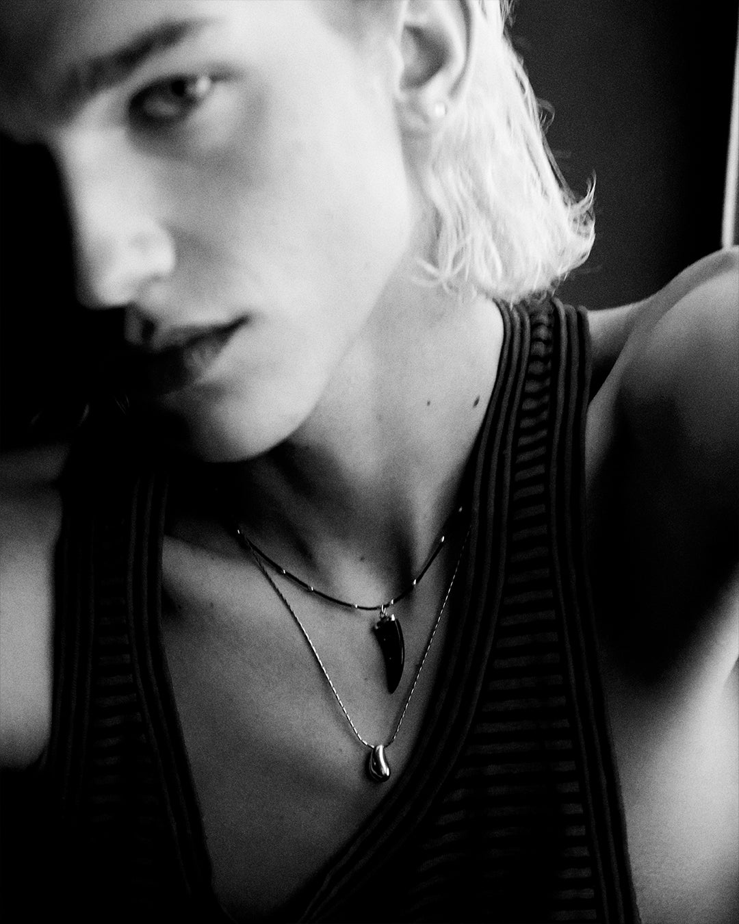 Blurry portrait of men model in black and white.