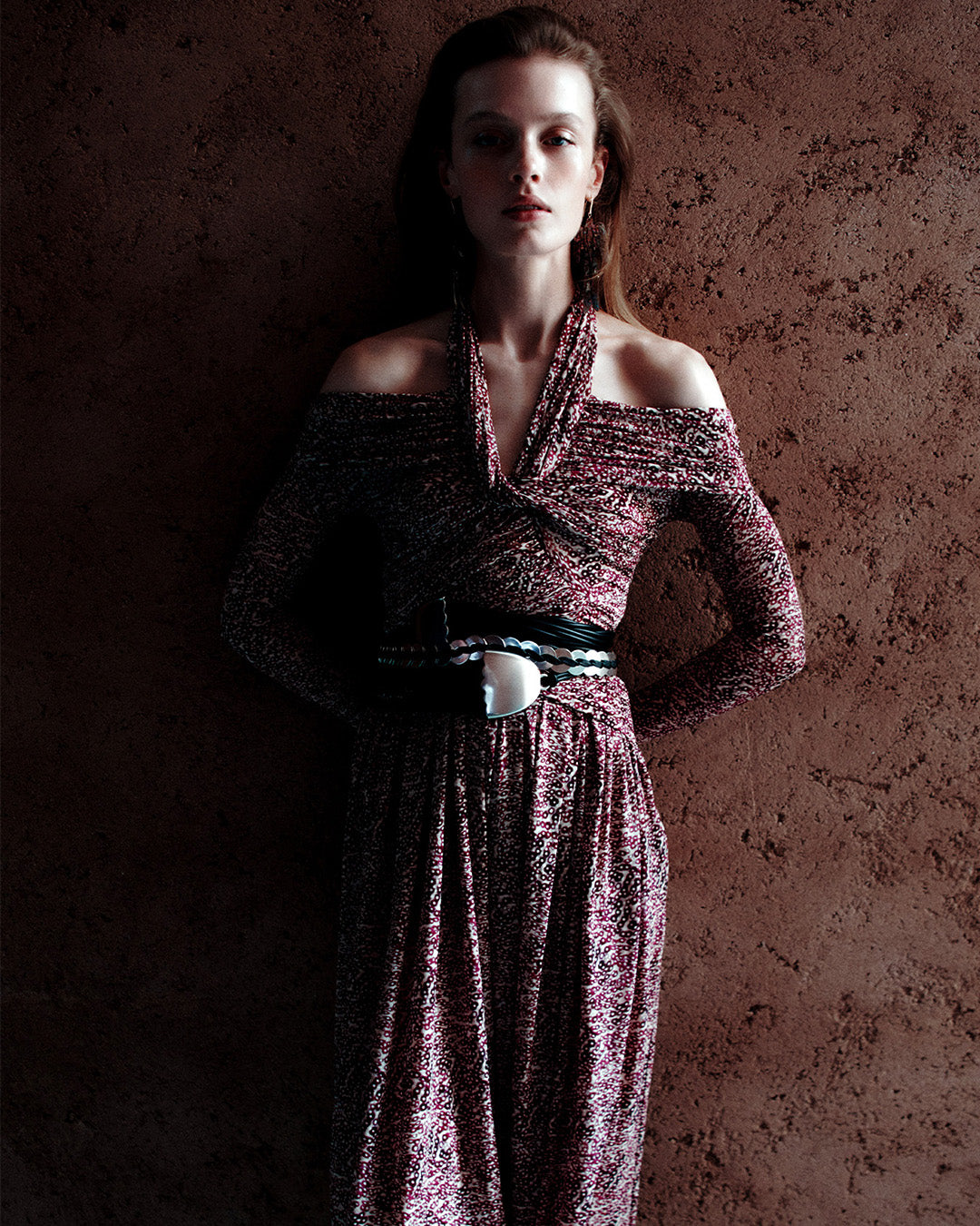 Feminine model, dressed in the Valentine Draped Dress in purple and ecru printed jersey