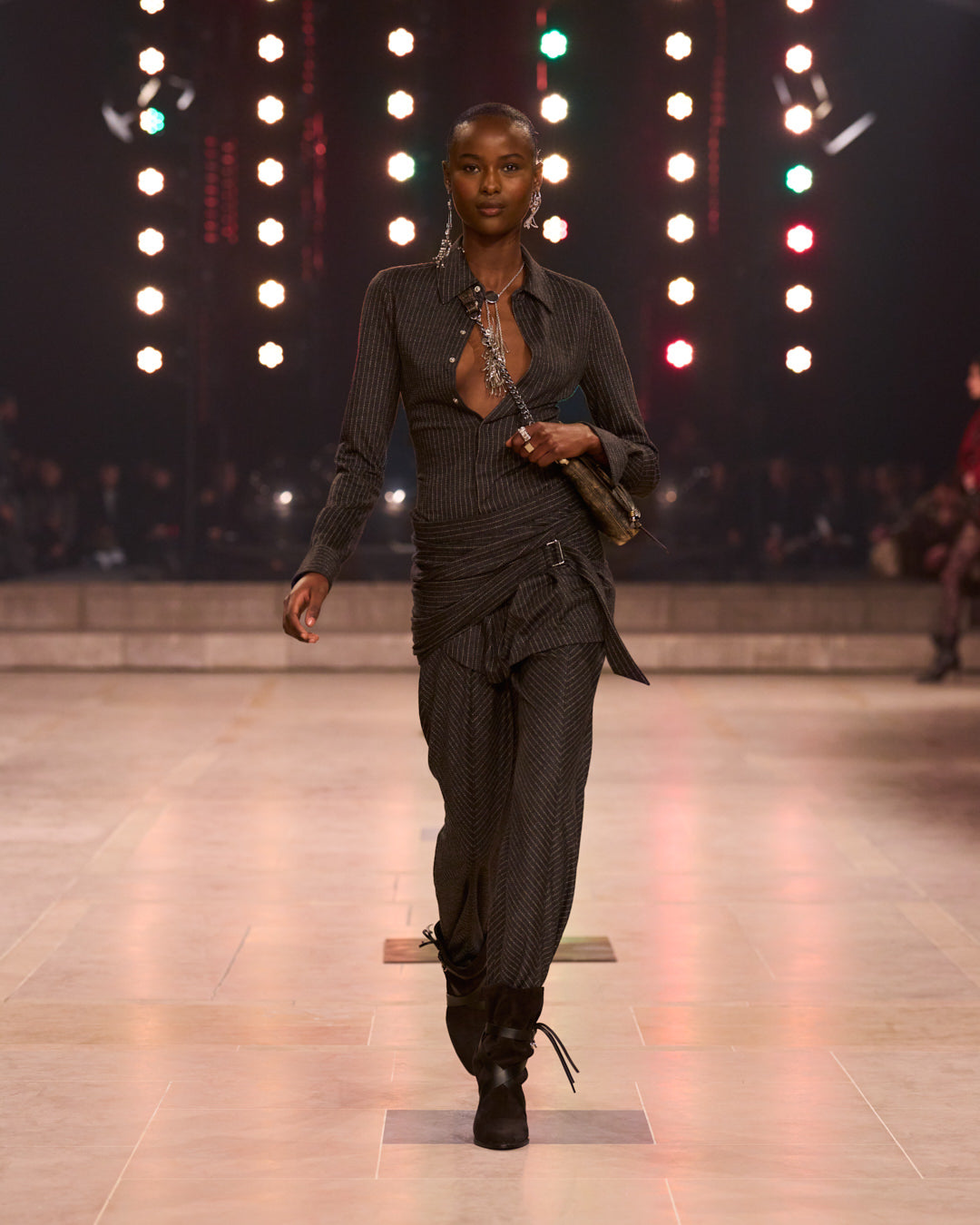 Total look with stripped on a model walking the FW25 show.