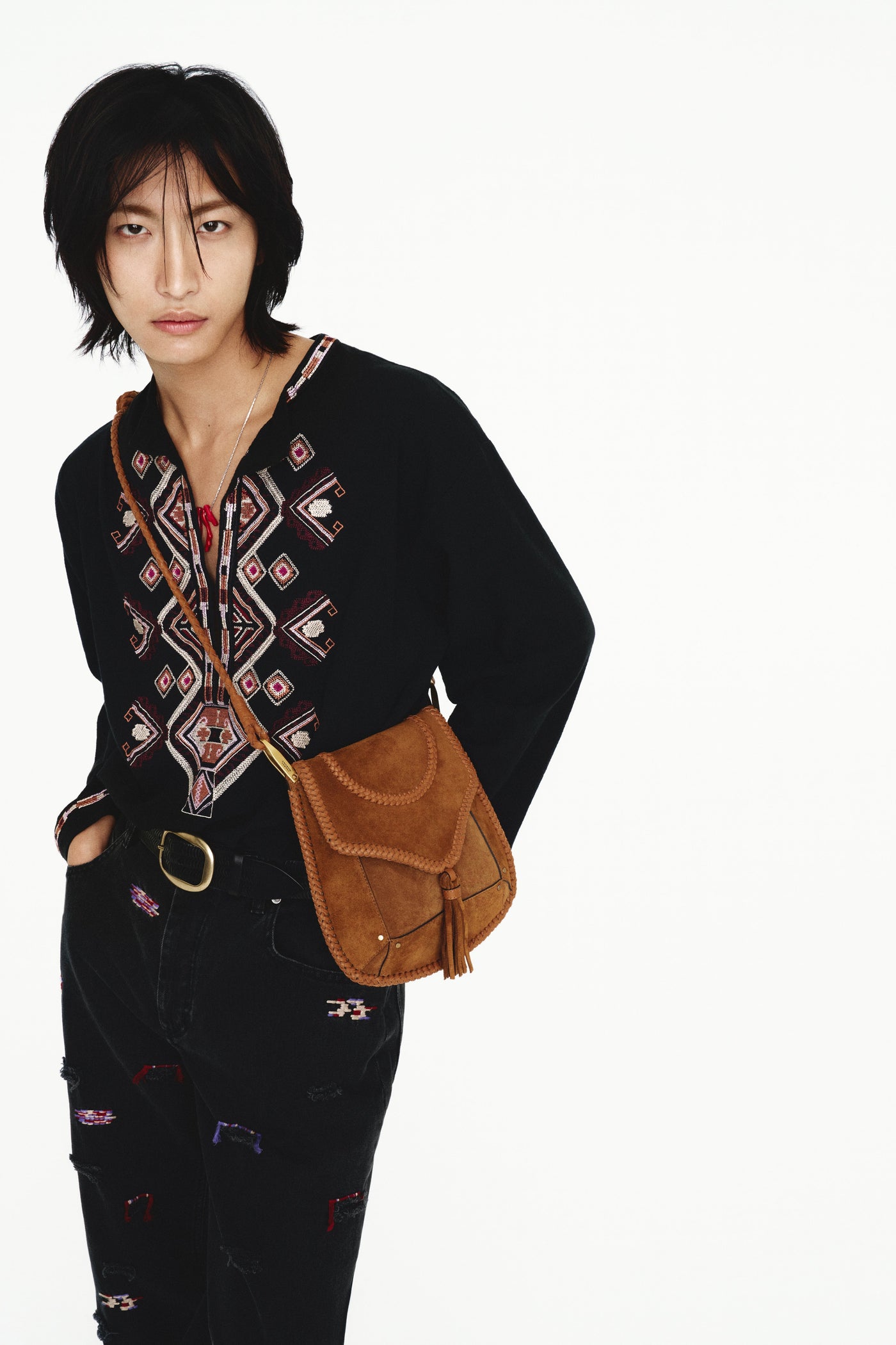 Seonghwa wears menswear ss25 collection with Anahi brown suede bag